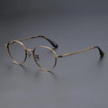 YIMARUILI Luxury Titanium Round Glasses – Retro Wide-Rimmed Frame